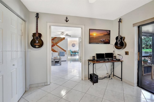 11914 SW 12th Ct, Davie, FL 33325 - corridor featuring baseboards, a desk, light tile patterned flooring, and stairway