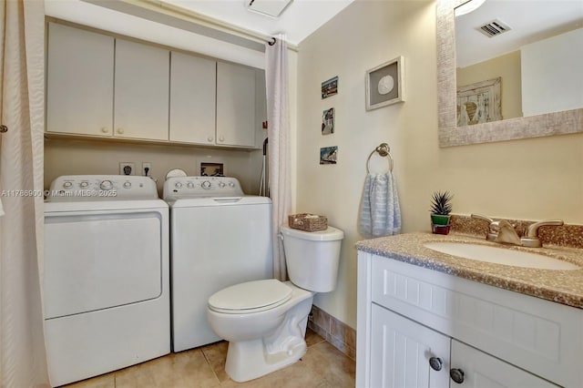 11914 SW 12th Ct, Davie, FL 33325 - bathroom with separate washer and dryer, tile patterned floors, vanity, and toilet