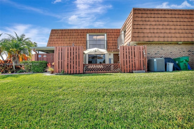 11914 SW 12th Ct, Davie, FL 33325 - view of grassy yard with central AC unit