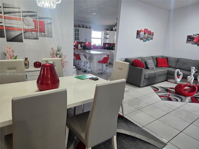 13061 SW 56th Ter, Miami, FL 33183 - dining room featuring light tile patterned floors and an inviting chandelier