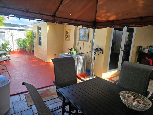 13061 SW 56th Ter, Miami, FL 33183 - view of patio featuring french doors and electric panel