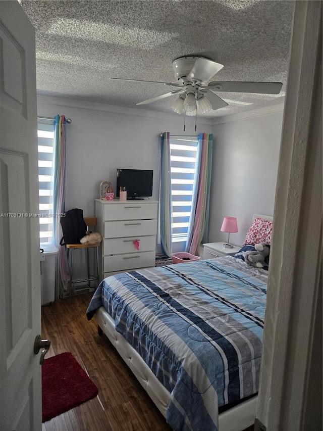 13061 SW 56th Ter, Miami, FL 33183 - bedroom with ornamental molding, a textured ceiling, a ceiling fan, and wood finished floors