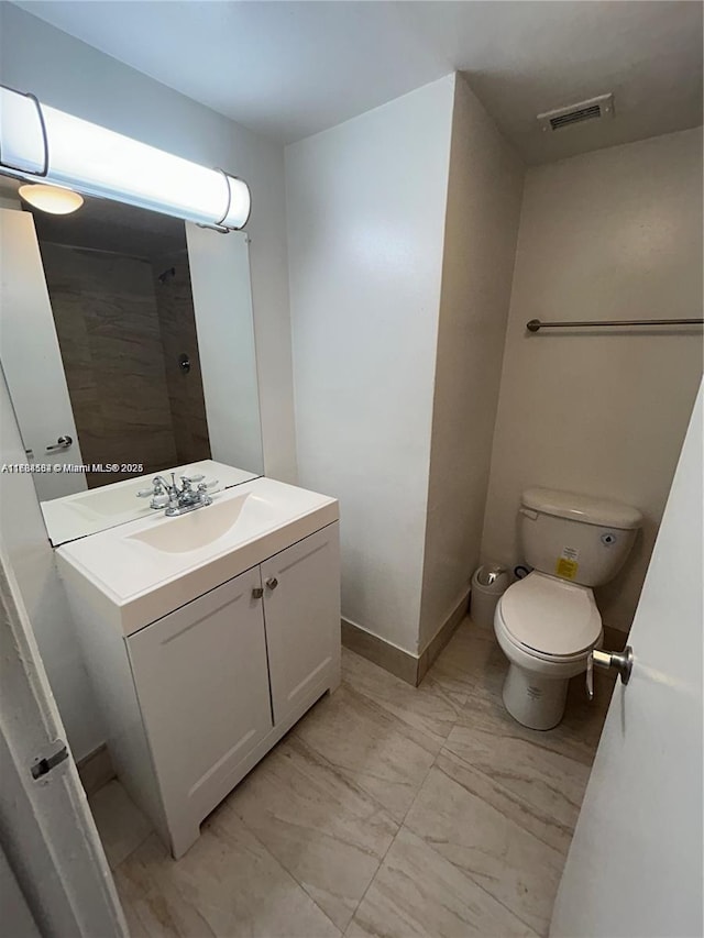 bathroom with visible vents, marble finish floor, vanity, and toilet