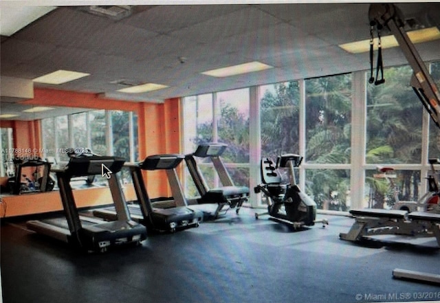 3500 Coral Way Unit 903, Miami, FL 33145 - gym featuring a wall of windows
