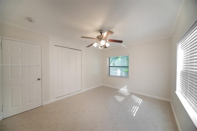 621 Hudson Rd, West Palm Beach, FL 33405 - unfurnished bedroom with ceiling fan, baseboards, a closet, and ornamental molding