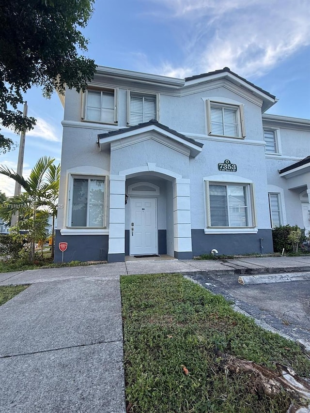 7353 NW 174th Ter Unit 107, Hialeah, FL 33015 - view of property with stucco siding