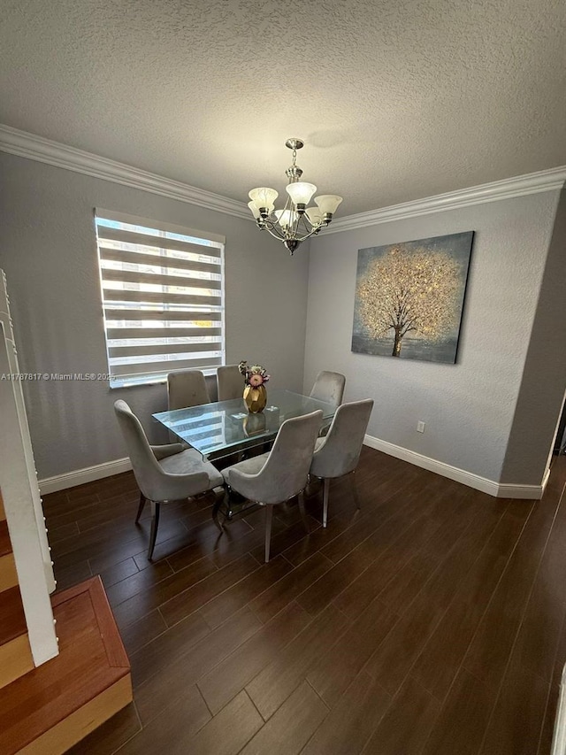 7353 NW 174th Ter Unit 107, Hialeah, FL 33015 - dining space with a chandelier, crown molding, a textured ceiling, and wood finished floors