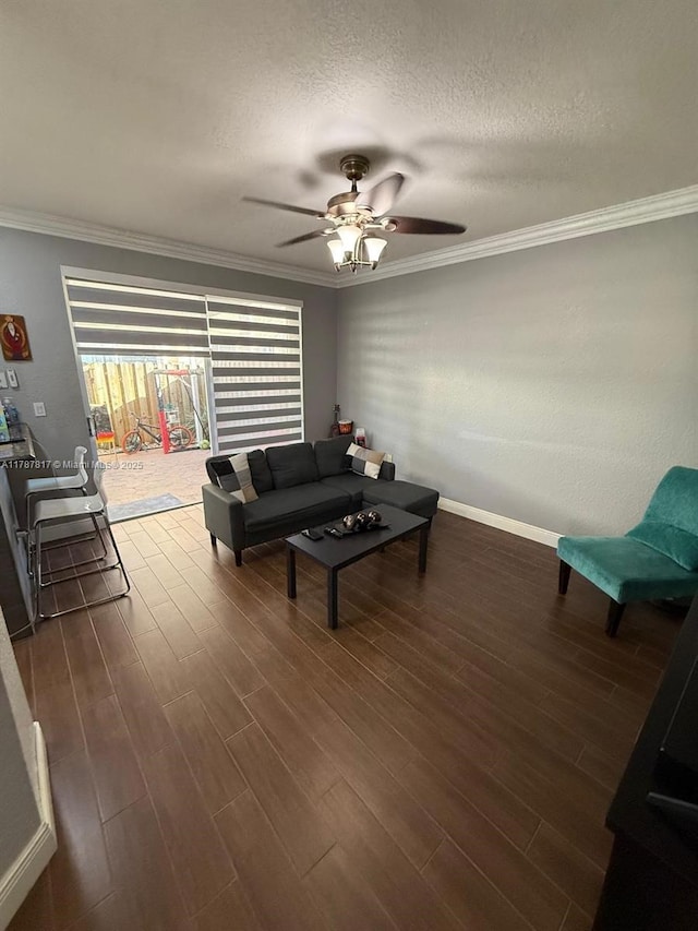 7353 NW 174th Ter Unit 107, Hialeah, FL 33015 - living room featuring a ceiling fan, crown molding, dark wood finished floors, and a textured ceiling