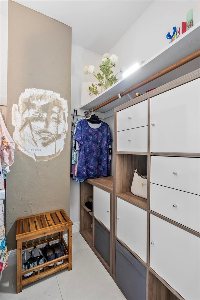 19390 Collins Ave Unit 706, Sunny Isles Beach, FL 33160 - spacious closet featuring light tile patterned flooring