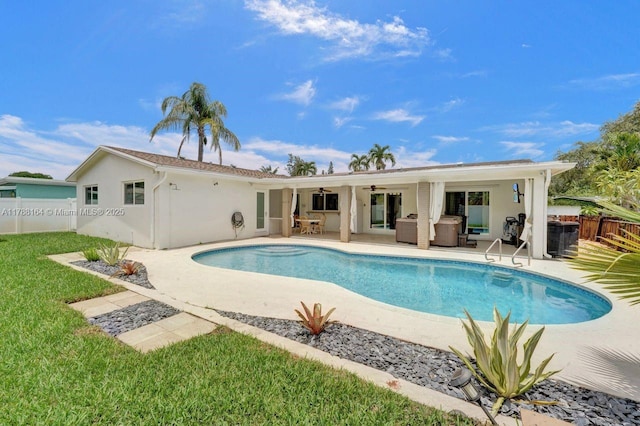 5031 SW 88th Ter, Cooper City, FL 33328 - rear view of house with a ceiling fan, a patio area, stucco siding, and outdoor lounge area