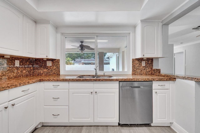 5031 SW 88th Ter, Cooper City, FL 33328 - kitchen featuring dishwasher, light wood-type flooring, dark stone counters, a ceiling fan, and ornamental molding