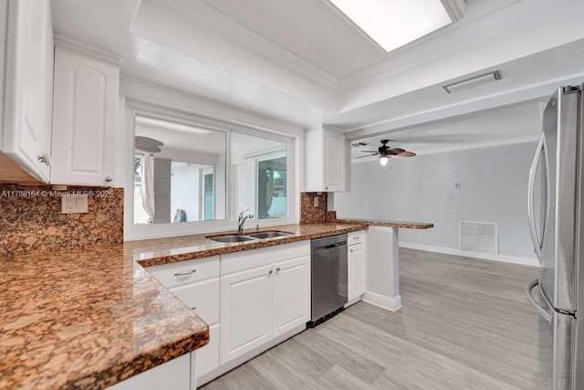 5031 SW 88th Ter, Cooper City, FL 33328 - kitchen featuring appliances with stainless steel finishes, light wood-type flooring, backsplash, white cabinets, and ornamental molding