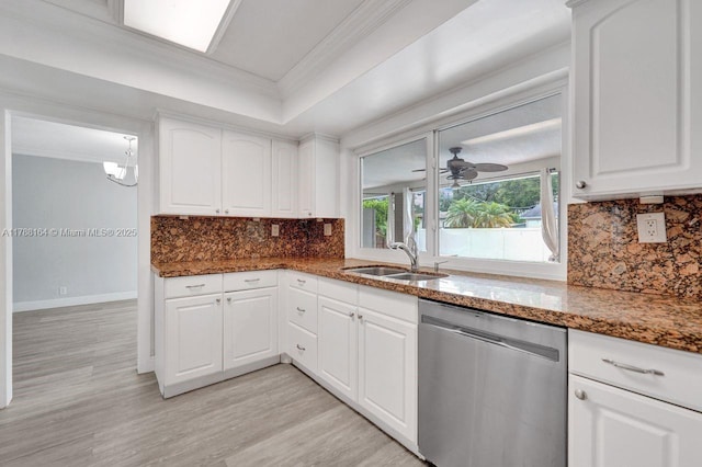 5031 SW 88th Ter, Cooper City, FL 33328 - kitchen featuring dishwasher, light wood-type flooring, dark stone countertops, ornamental molding, and decorative backsplash