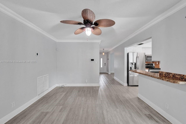 5031 SW 88th Ter, Cooper City, FL 33328 - empty room with light wood finished floors, a ceiling fan, and crown molding