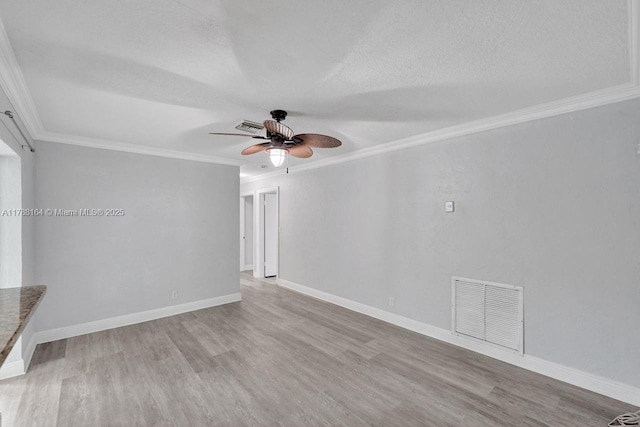 5031 SW 88th Ter, Cooper City, FL 33328 - spare room with a ceiling fan, crown molding, wood finished floors, and a textured ceiling