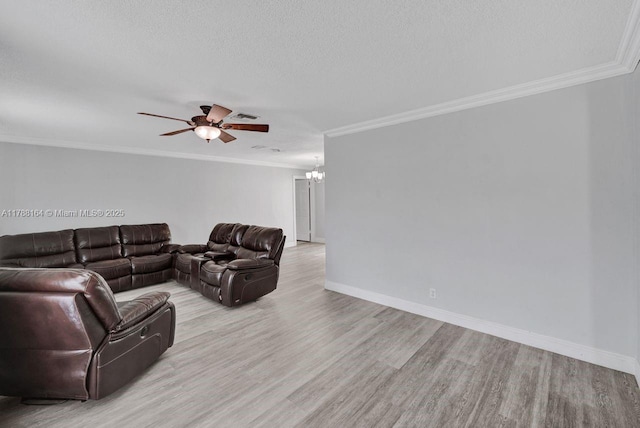 5031 SW 88th Ter, Cooper City, FL 33328 - living area with wood finished floors, a chandelier, a ceiling fan, ornamental molding, and a textured ceiling