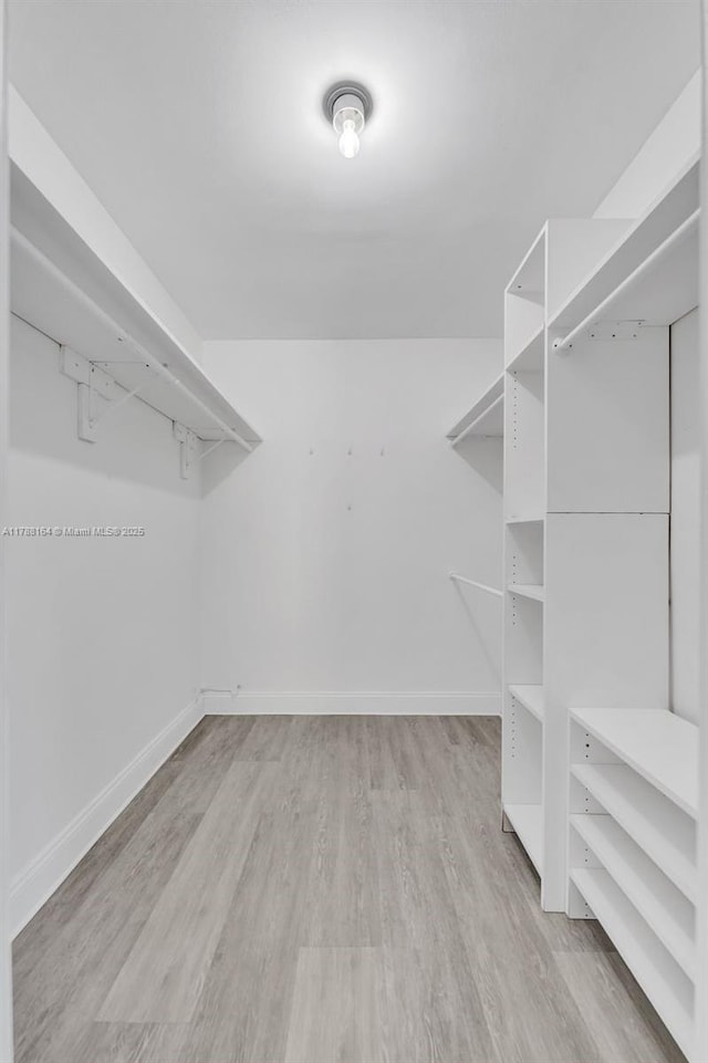 5031 SW 88th Ter, Cooper City, FL 33328 - walk in closet featuring light wood finished floors