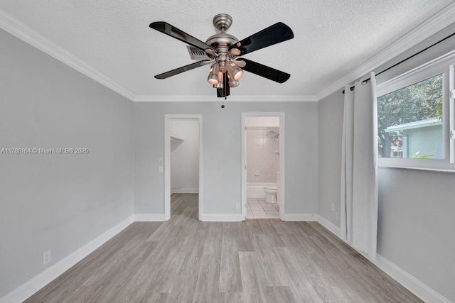 5031 SW 88th Ter, Cooper City, FL 33328 - unfurnished room with a textured ceiling, wood finished floors, crown molding, and a ceiling fan
