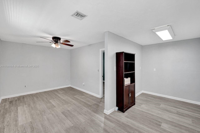 5031 SW 88th Ter, Cooper City, FL 33328 - unfurnished room with a ceiling fan and light wood-style flooring