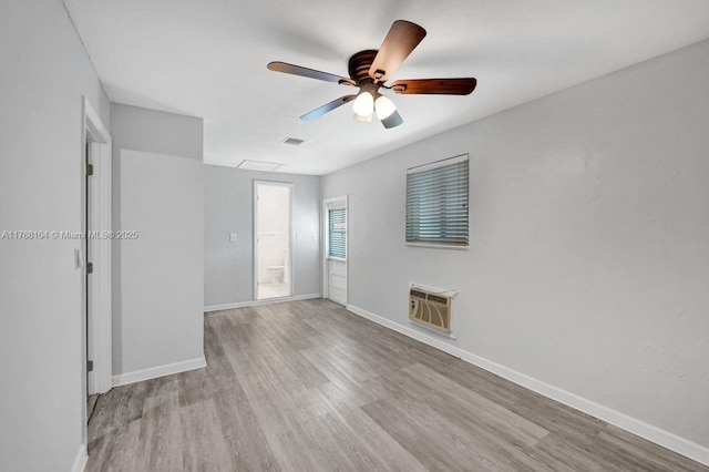5031 SW 88th Ter, Cooper City, FL 33328 - unfurnished bedroom featuring wood finished floors, a wall mounted air conditioner, and ceiling fan