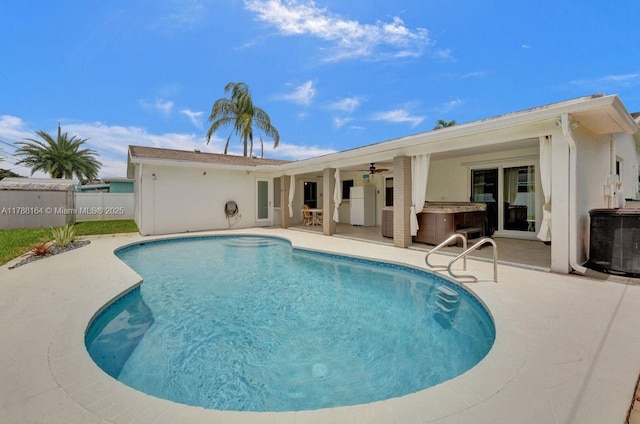 5031 SW 88th Ter, Cooper City, FL 33328 - view of swimming pool with a patio area, a ceiling fan, and a hot tub