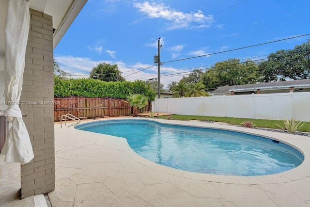 5031 SW 88th Ter, Cooper City, FL 33328 - view of swimming pool featuring a fenced backyard and a patio area
