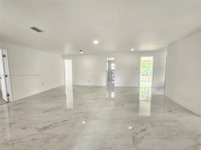 11712 NW 3rd Ave, Miami, FL 33168 - unfurnished room with baseboards, visible vents, recessed lighting, and marble finish floor
