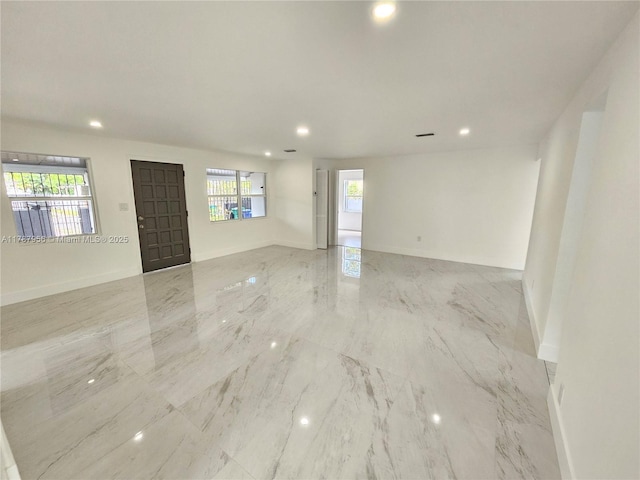 11712 NW 3rd Ave, Miami, FL 33168 - unfurnished room featuring recessed lighting, marble finish floor, and baseboards