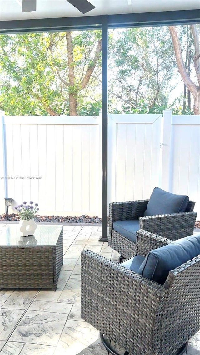 10315 W 32nd Ln, Hialeah, FL 33018 - fenced backyard with a patio and outdoor lounge area