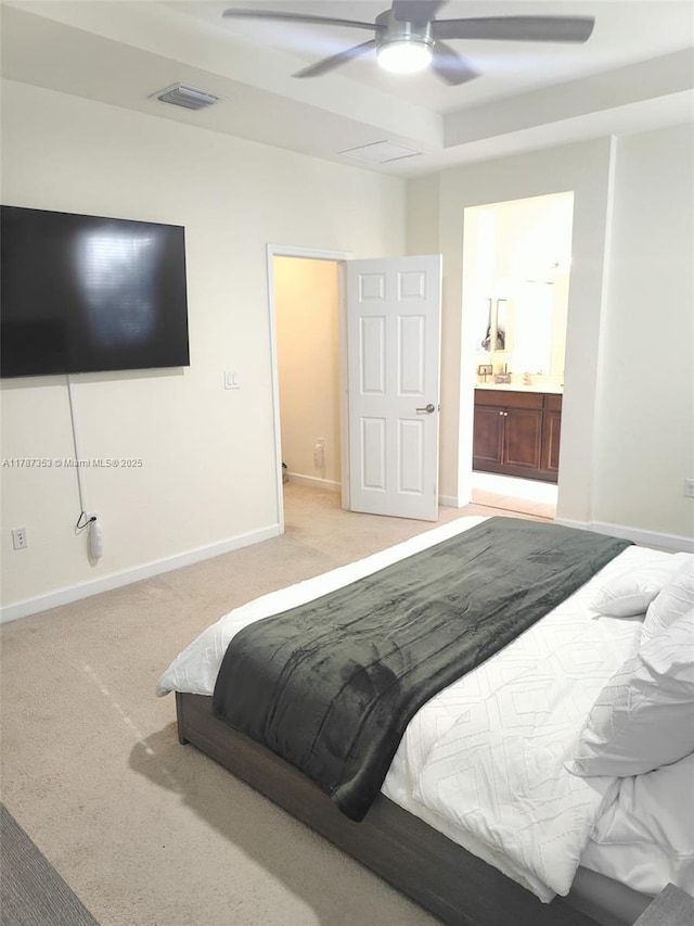10315 W 32nd Ln, Hialeah, FL 33018 - bedroom with baseboards, light carpet, and ensuite bathroom