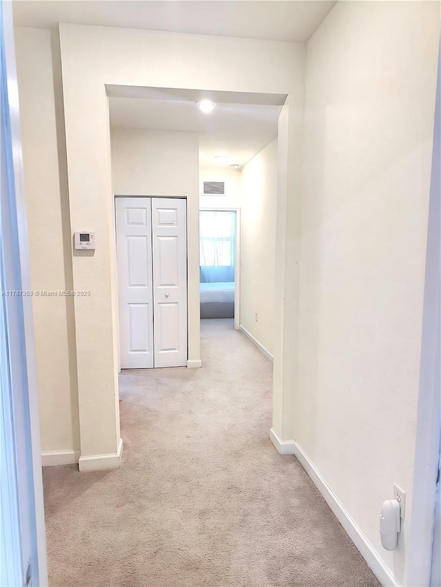 10315 W 32nd Ln, Hialeah, FL 33018 - hall featuring carpet flooring and baseboards