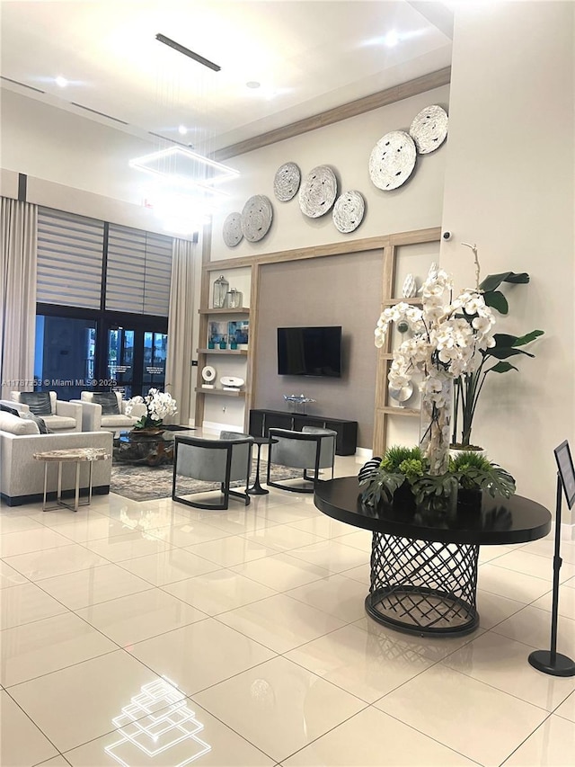 10315 W 32nd Ln, Hialeah, FL 33018 - tiled living area featuring a towering ceiling