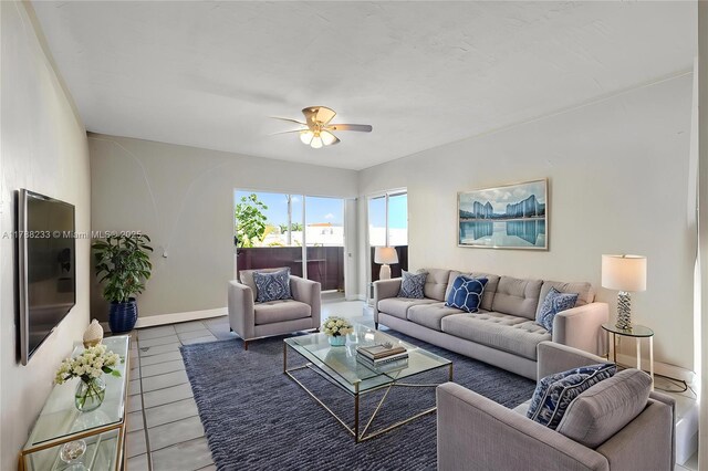 1205 Mariposa Ave Unit 413, Coral Gables, FL 33146 - tiled living area with a ceiling fan and baseboards