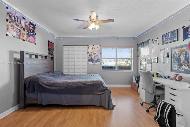 1205 Mariposa Ave Unit 413, Coral Gables, FL 33146 - bedroom featuring ceiling fan, baseboards, and light wood-style floors