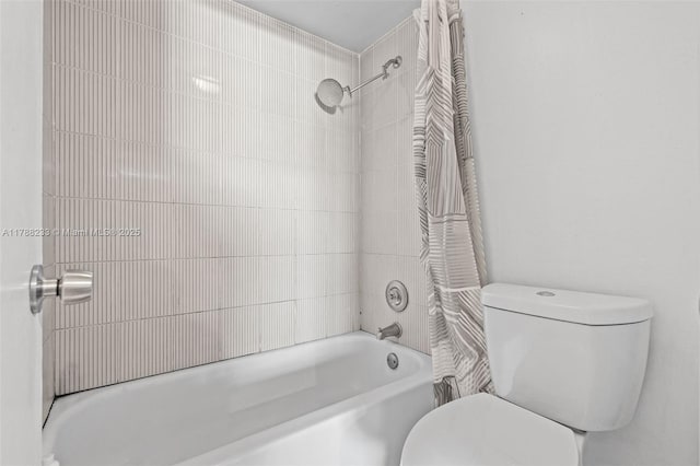 1205 Mariposa Ave Unit 413, Coral Gables, FL 33146 - bathroom featuring shower / bathtub combination with curtain and toilet