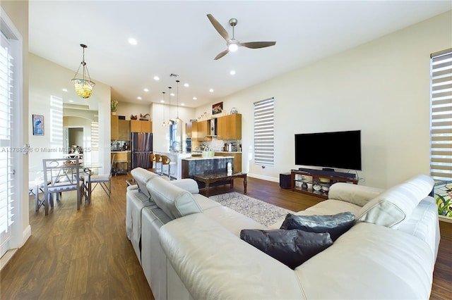 living room featuring visible vents, recessed lighting, dark wood-type flooring, and ceiling fan