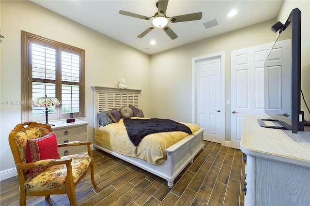 bedroom featuring recessed lighting, baseboards, visible vents, and dark wood-style floors