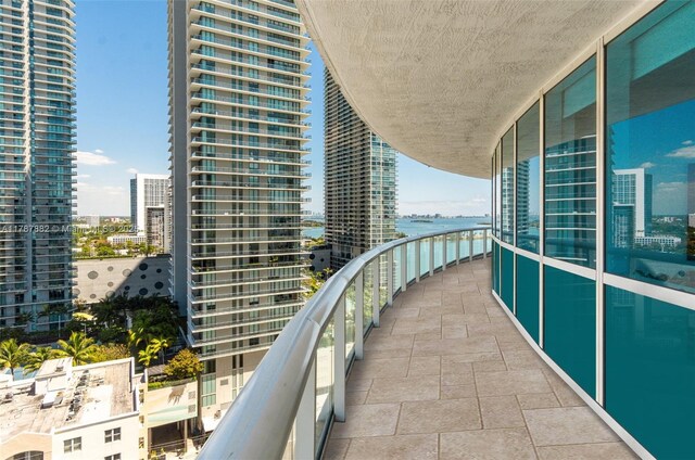 480 NE 30th St Unit 1807, Miami, FL 33137 - balcony with a water view and a city view