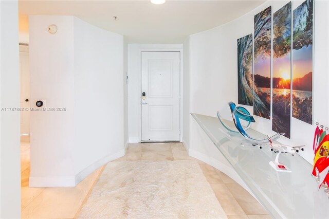 480 NE 30th St Unit 1807, Miami, FL 33137 - bathroom featuring baseboards and tile patterned floors