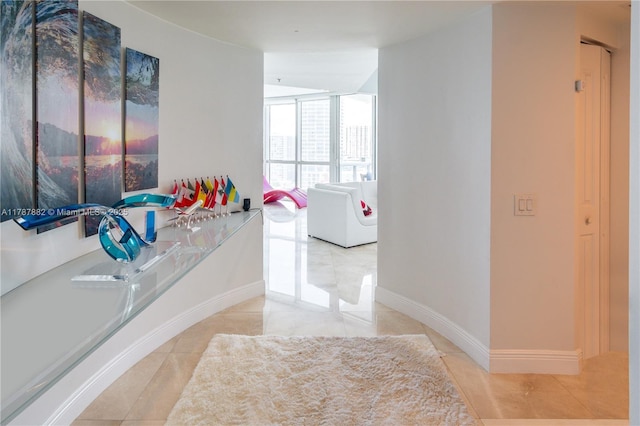 480 NE 30th St Unit 1807, Miami, FL 33137 - bathroom with baseboards and tile patterned flooring