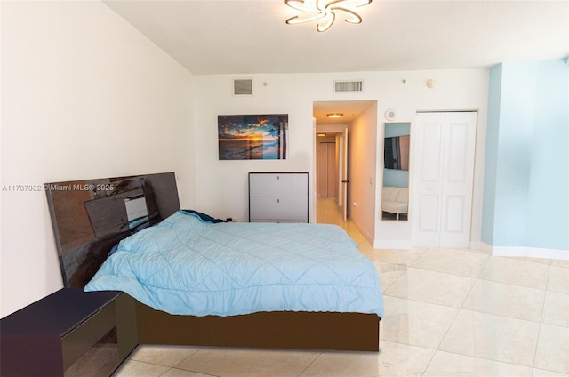 480 NE 30th St Unit 1807, Miami, FL 33137 - bedroom with baseboards, visible vents, and tile patterned flooring