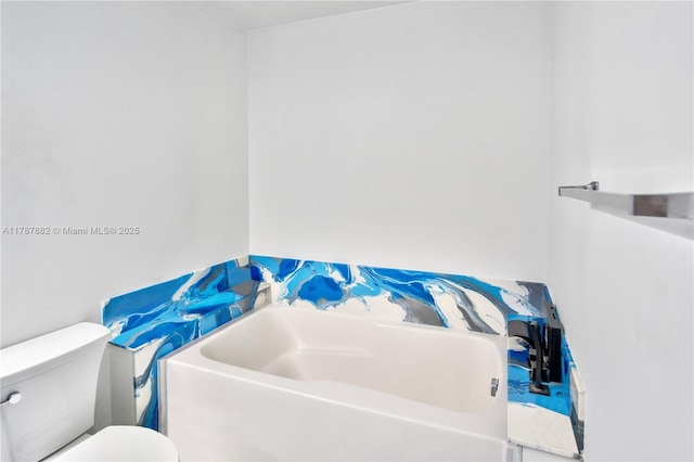 480 NE 30th St Unit 1807, Miami, FL 33137 - bathroom featuring a garden tub and toilet