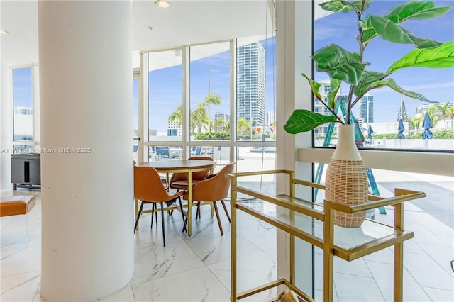 480 NE 30th St Unit 1807, Miami, FL 33137 - dining room with a city view and marble finish floor