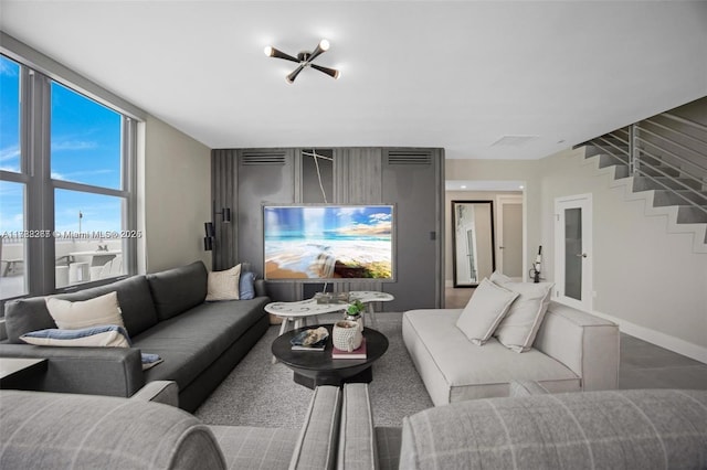 2899 Collins Ave Pha, Pha, Miami Beach, FL 33140 - living area featuring baseboards, visible vents, and stairs
