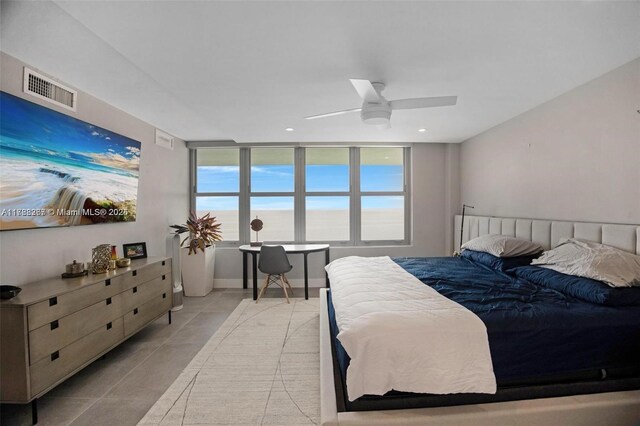 2899 Collins Ave Pha, Pha, Miami Beach, FL 33140 - bedroom with ceiling fan, visible vents, and light tile patterned floors