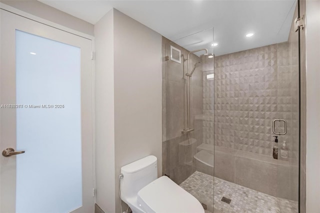 2899 Collins Ave Pha, Pha, Miami Beach, FL 33140 - bathroom with visible vents, recessed lighting, a shower stall, and toilet