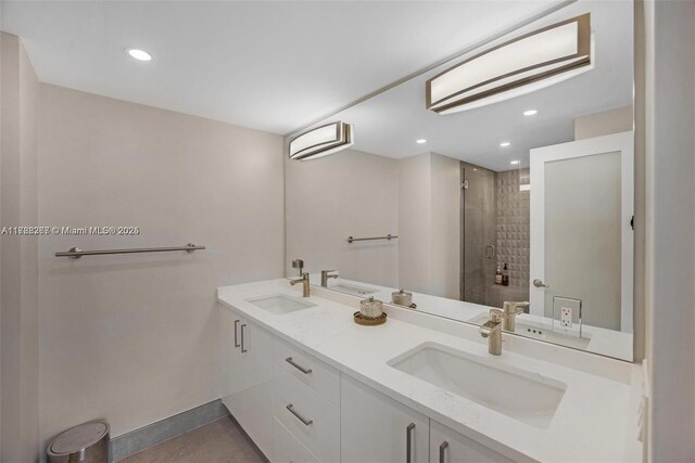 2899 Collins Ave Pha, Pha, Miami Beach, FL 33140 - bathroom with baseboards, a stall shower, and a sink