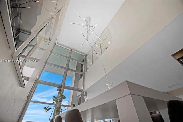 2899 Collins Ave Pha, Pha, Miami Beach, FL 33140 - room details with visible vents and an inviting chandelier