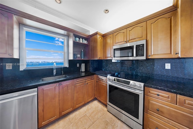 1865 79th St Phi, Csw, Phi, North Bay Village, FL 33141 - kitchen featuring stainless steel appliances, a sink, light tile patterned floors, open shelves, and dark stone counters