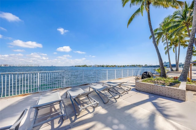 1865 79th St Phi, Csw, Phi, North Bay Village, FL 33141 - view of patio featuring a water view and area for grilling
